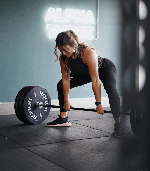 Woman on Airbike during HIIT training